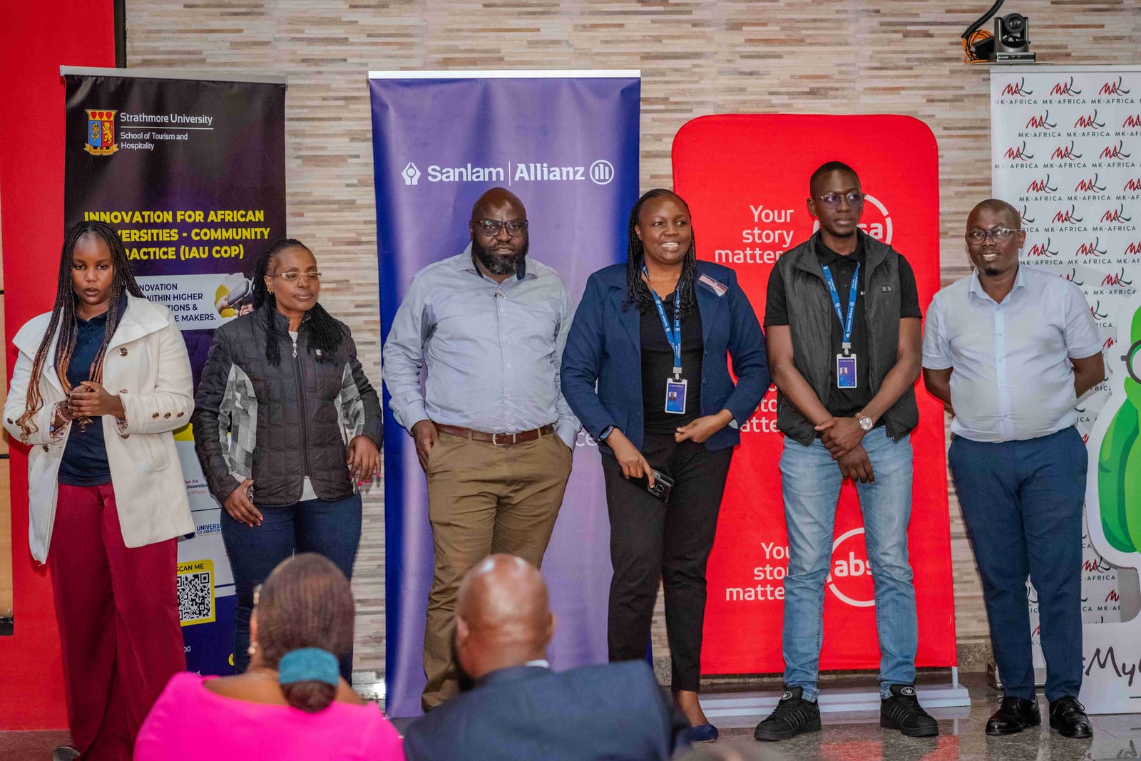 Sponsors, judges and partners on stage.